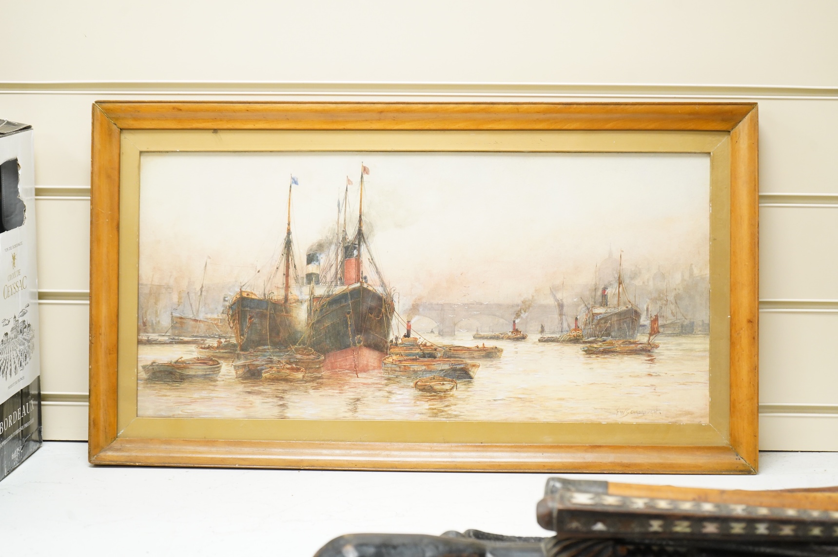 Frederick William Scarborough (1860-1939), Thames view with tug boats and ships, signed, watercolour, 23 x 52cm